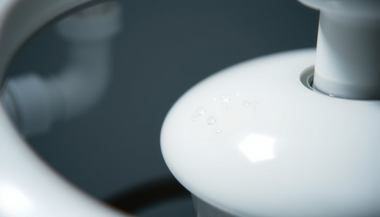 sweating pipes and toilet bowl close-up view